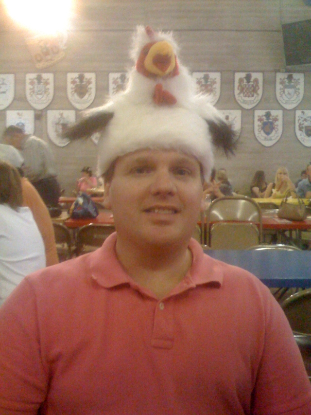 Chapel with a chicken on his head
